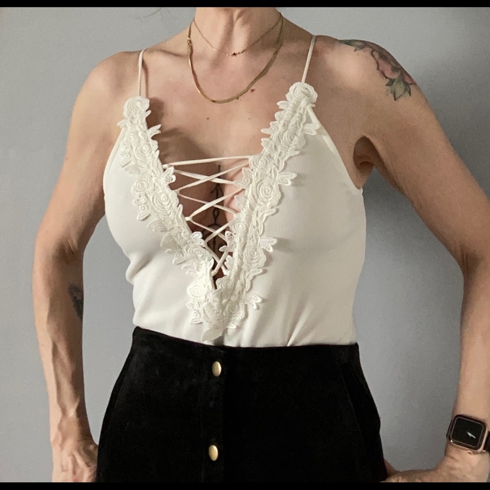 Express | white bodysuit | lace up front | floral appliqué